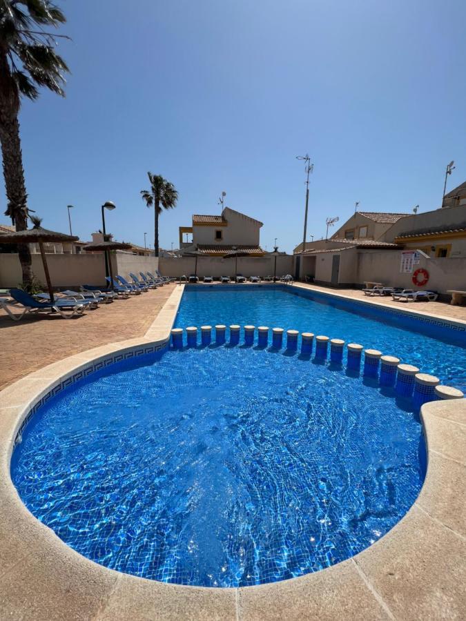 Appartement Bonito Adosado Con Piscina A 200 M De La Playa à El Mojon  Extérieur photo