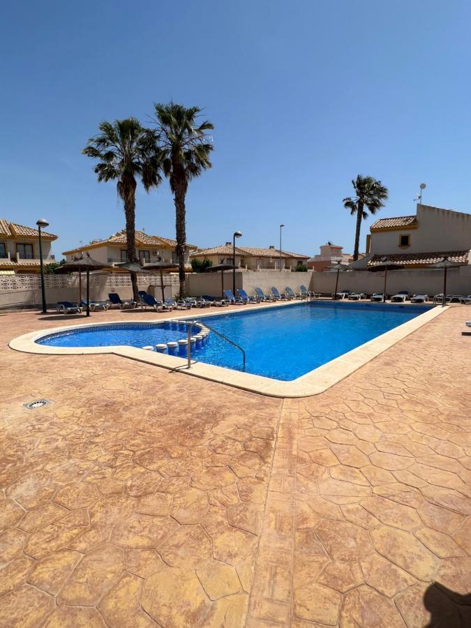 Appartement Bonito Adosado Con Piscina A 200 M De La Playa à El Mojon  Extérieur photo